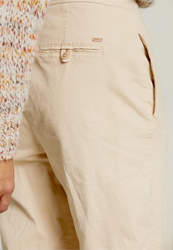 Pantalon taille haute beige avec poches passepoilées